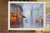 Artwork from 2024 teen art show. A painting of a rainy city street.